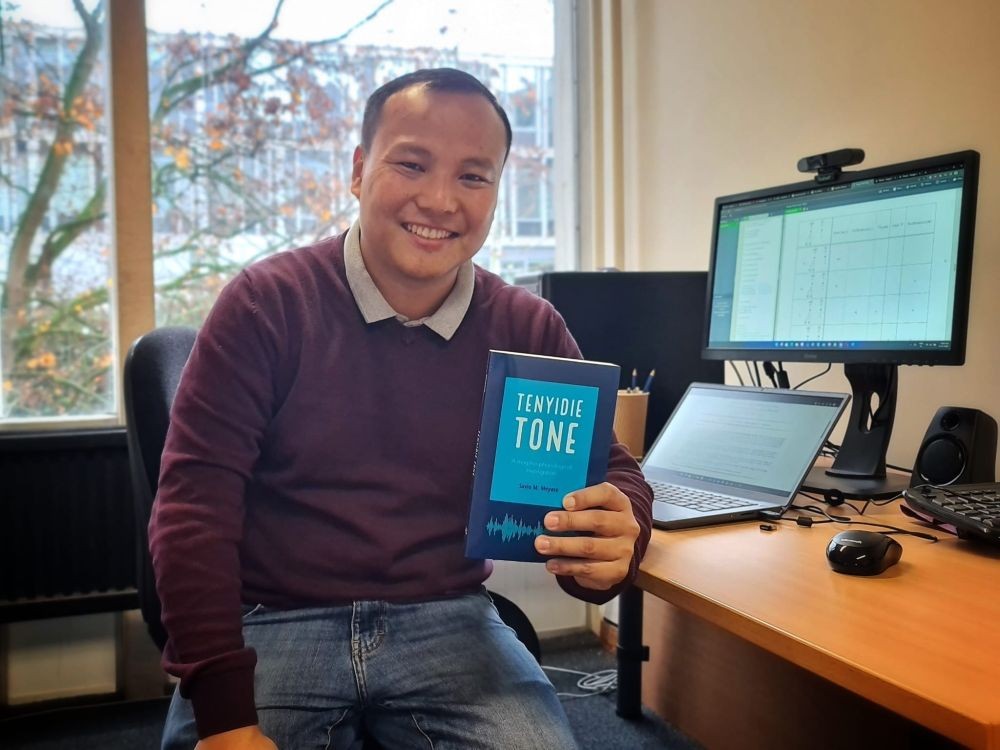 Dr Savio Megolhuto Meyase with his newly released book - Tenyidie Tone.